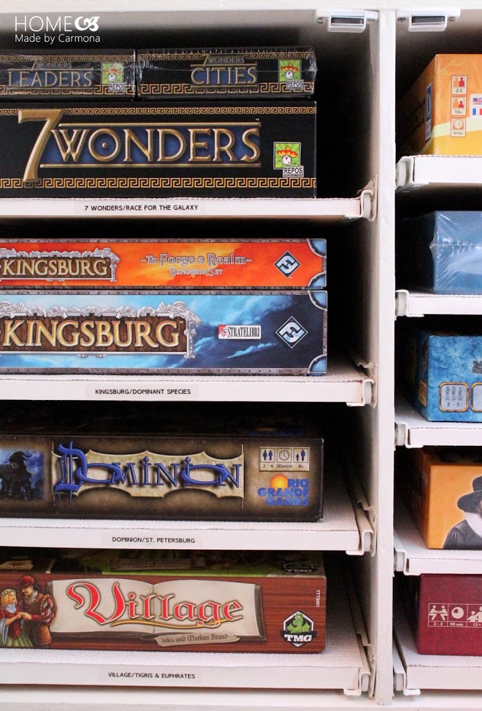 Modern board game cabinet pullouts with labels