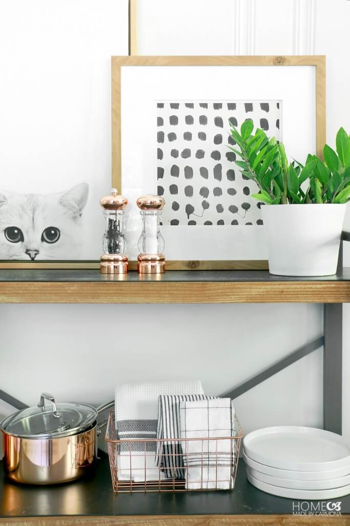 Kitchen accessories in a wire basket on some shelves