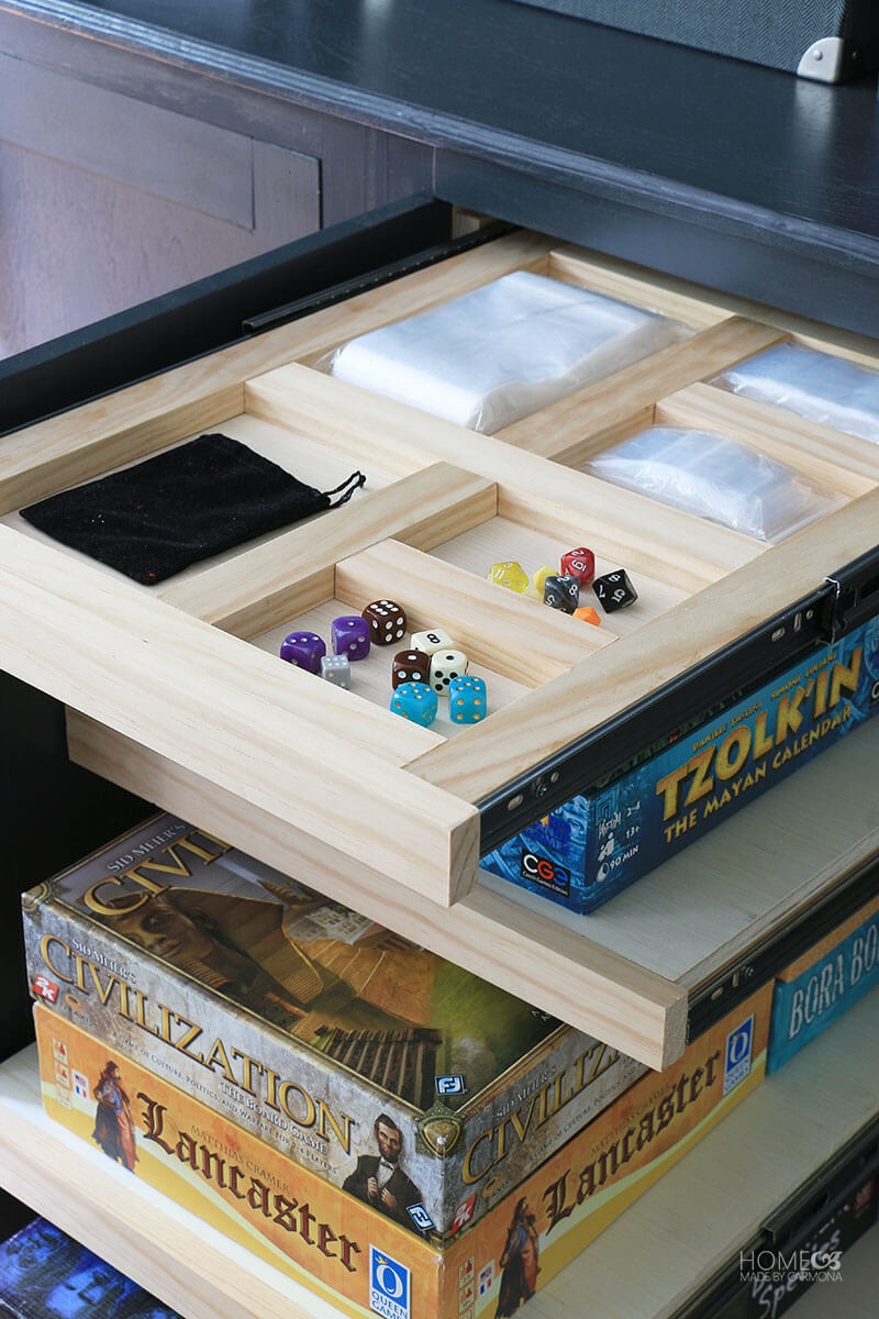 Customized drawer pullout compartments with storage for dice and game pieces