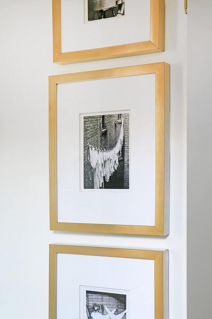 Art prints taken from photo books and framed on the wall