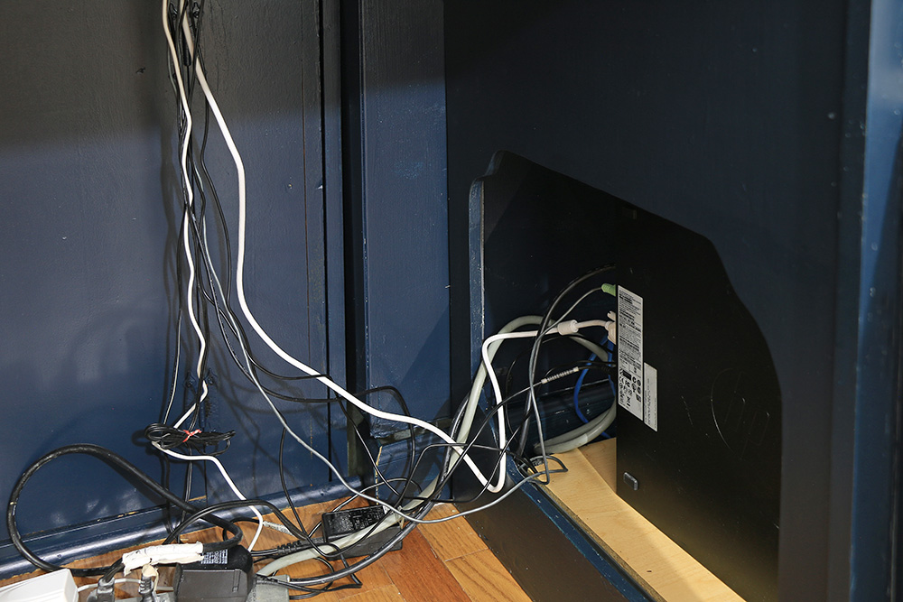 Cords out of side of cabinet office base