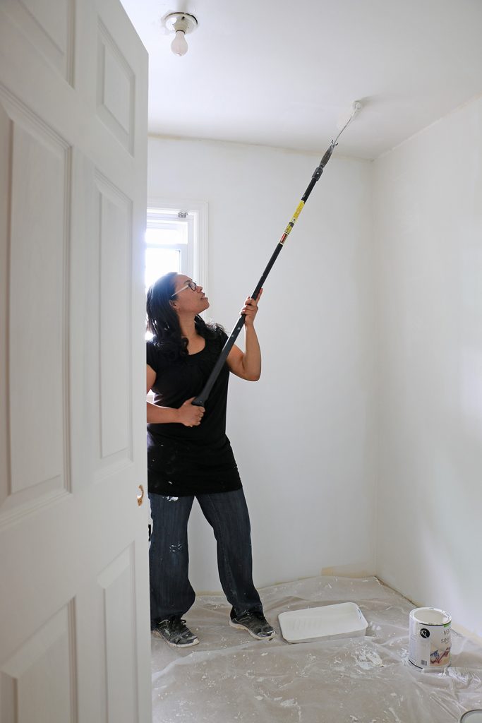 Ursula Carmona painting walls and ceilings