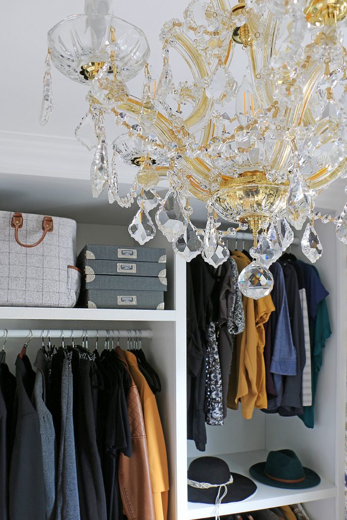 Master closet with chandelier
