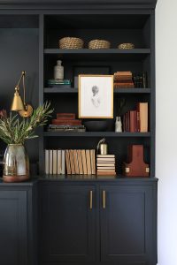 Moody color on bookcase design