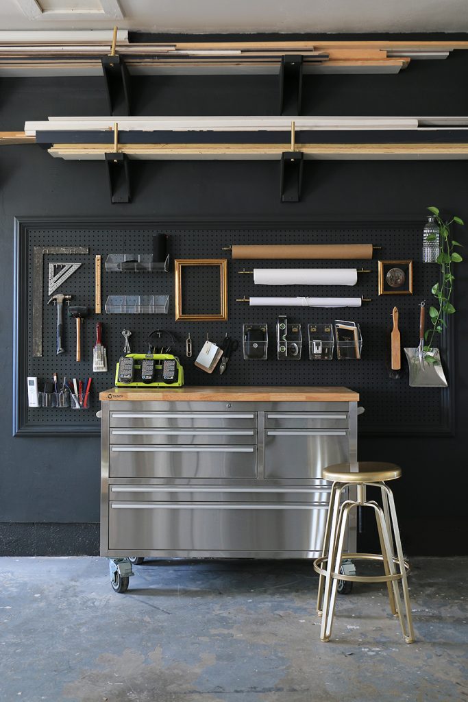 Garage with pegboard and small artwork