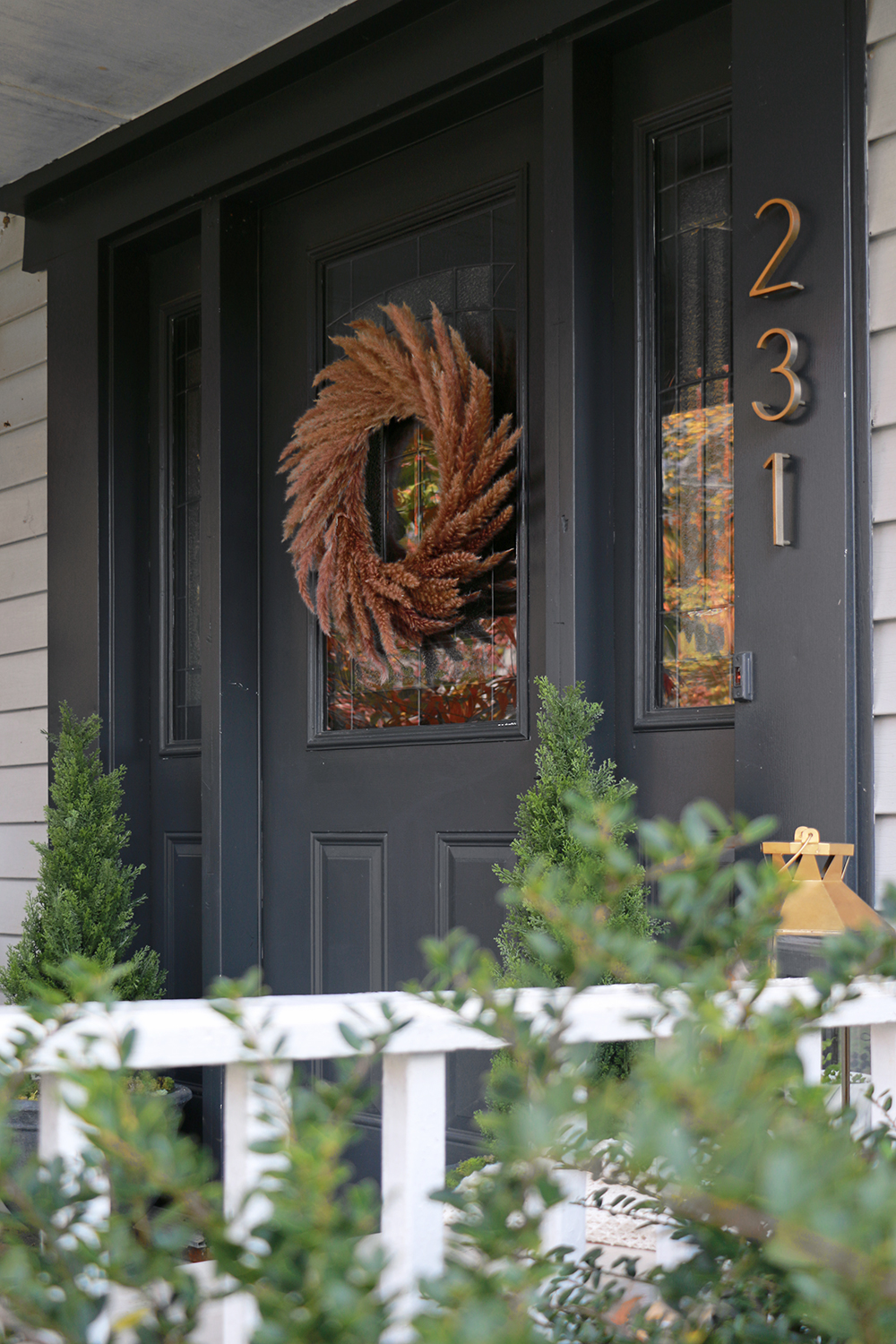 Front door with seasonal wreath